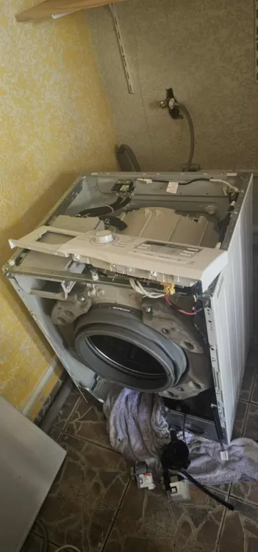 Changement joint hublot sur machine à laver frontal au Tampon Reunion